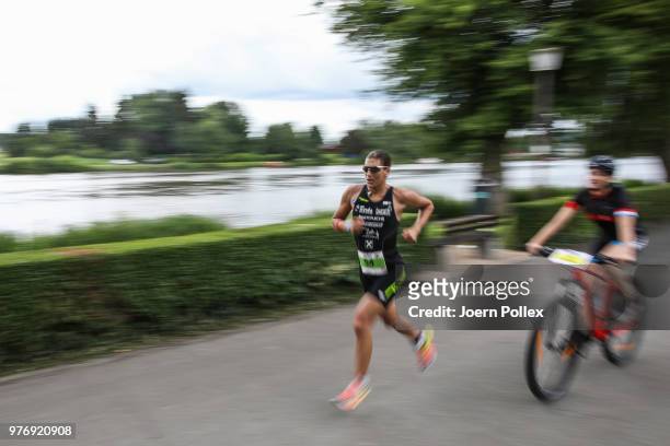 Lisa Huetthaler of Austria competes in the run section of the IRONMAN 70.3 Luxembourg-Region Moselle race on June 17, 2018 in Luxembourg, Luxembourg.