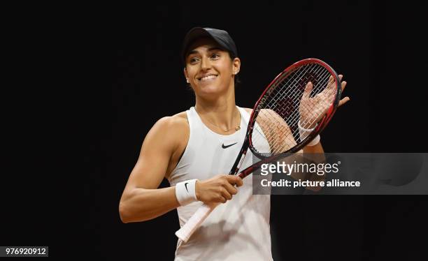 April 2018, Stuttgart, Germany: Tennis: WTA-Tour - Stuttgart, Singles, Ladies: France's Caroline Garcia celebrating after her victory against the...