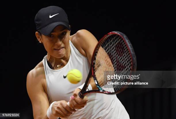 French tennis player Caroline Garcia returns to Ukrainian Marta Kostyuk during their 2018 Stuttgart Open round of 16 women's singles match against...