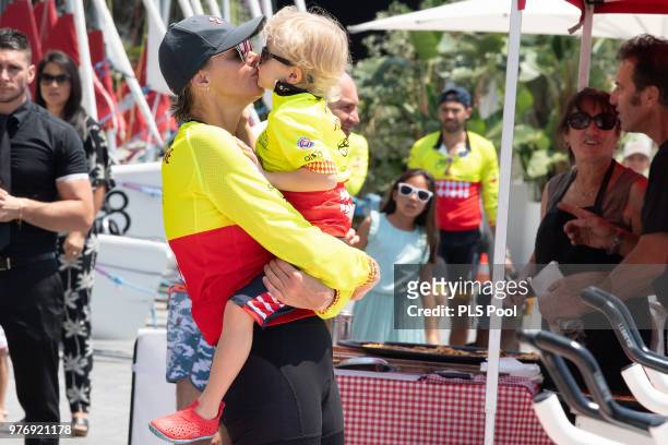 Princess Charlene of Monaco kisses her son Prince Jacques of Monaco during the Riviera Water Bike Challenge 2018 on June 17, 2018 in Monaco, Monaco.