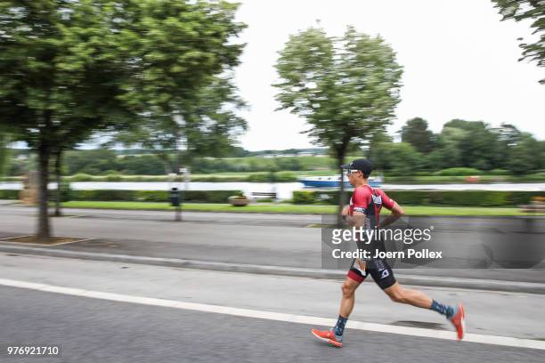 An athlete competes in the run section of the IRONMAN 70.3 Luxembourg-Region Moselle race on June 17, 2018 in Luxembourg, Luxembourg.