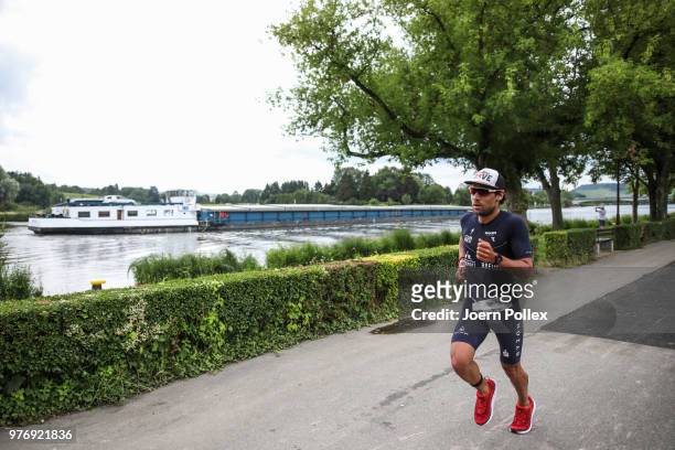 An athlete competes in the run section of the IRONMAN 70.3 Luxembourg-Region Moselle race on June 17, 2018 in Luxembourg, Luxembourg.