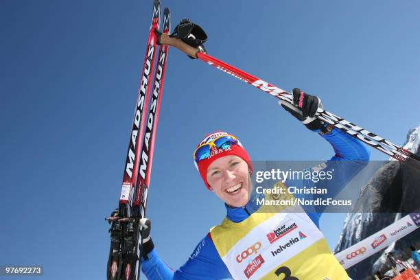 Susanne Nystroem of Sweden celebrates after winning the FIS Marathon Cup Engadin on March 14, 2010 Scuol, Switzerland.