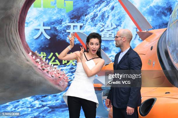 English actor Jason Statham and Chinese actress Li Bingbing attend the press conference of film 'The Meg' during the 21st Shanghai International Film...