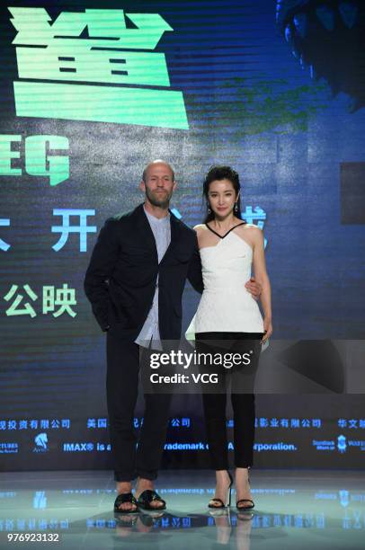 English actor Jason Statham and Chinese actress Li Bingbing attend the press conference of film 'The Meg' during the 21st Shanghai International Film...