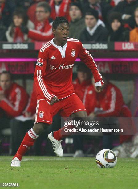 David Alaba of Muenchen runs with the ball during the Bundesliga match between FC Bayern Muenchen and SC Freiburg at Allianz Arena on March 13, 2010...