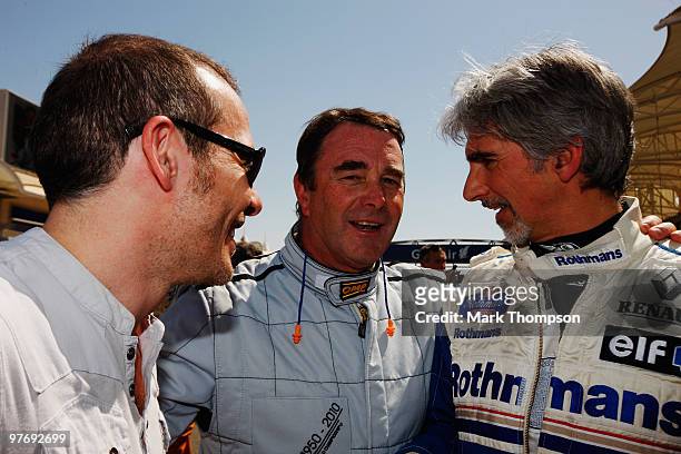 Former F1 World Champions Jacques Villeneuve, Nigel Mansell and Damon Hill are seen on the grid during celebrations of the 60th Anniversary of the F1...