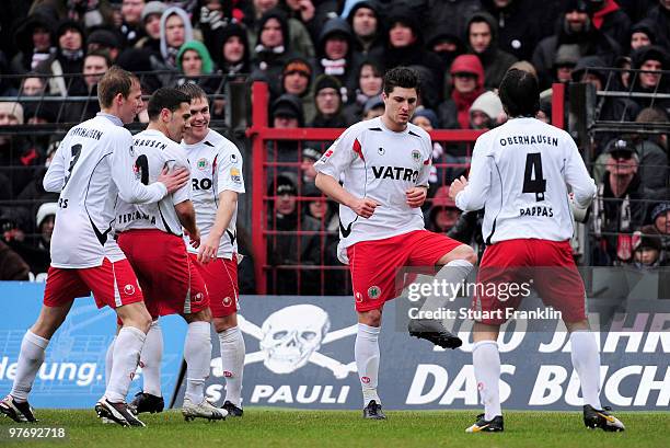 Moritz Stoppelkamp of Oberhausen celebrates scoring his teams first goal with teamates during the Second Bundesliga match between FC St. Pauli and...