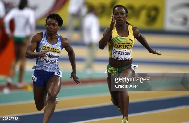 Jamaica's Veronica Campbell-Brown and Gabon's Paulette Ruddy Zang Milama compete in heat 1 of the women's 60m semi-final at the 2010 IAAF World...
