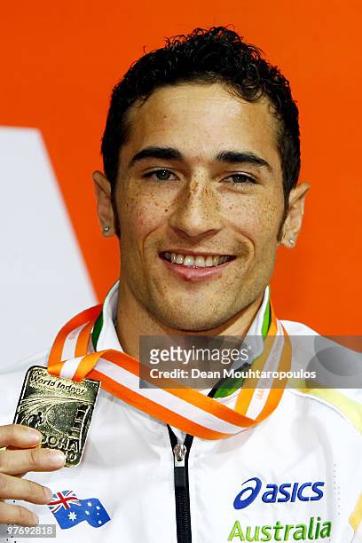 Fabrice Lapierre of Australia poses with the gold during the medal ceremony for the Mens Long Jump during Day 3 of the IAAF World Indoor...