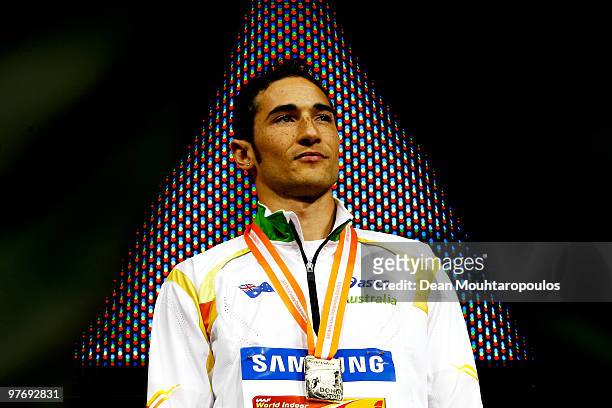 Fabrice Lapierre of Australia poses with the gold during the medal ceremony for the Mens Long Jump during Day 3 of the IAAF World Indoor...