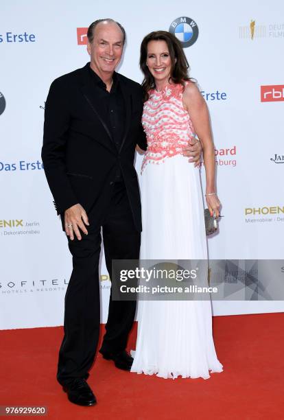 April 2018, Germany, Berlin: Actor Herbert Knaup with his wife Christiane Knaup arriving at the 68th award ceremony of the German film prize 'Lola'....