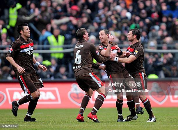 Matthias Lehmann of St. Pauli celebrates scoring the second goal with teamates during the Second Bundesliga match between FC St. Pauli and Rot-Weiss...