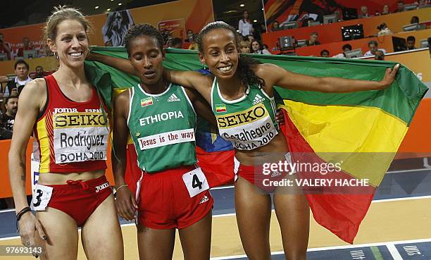 Spain's Natalia Rodriguez, Ethiopia's Gelete Burka and Ethiopia's Kalkidan Gezahegne celebrate after finishing respectiveley second, third and first...