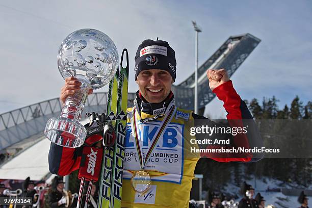 Jason Lamy-Chappuis of France celebrates his overall world cup victory after the last race of the season in the Gundersen Ski Jumping HS 134/10km...