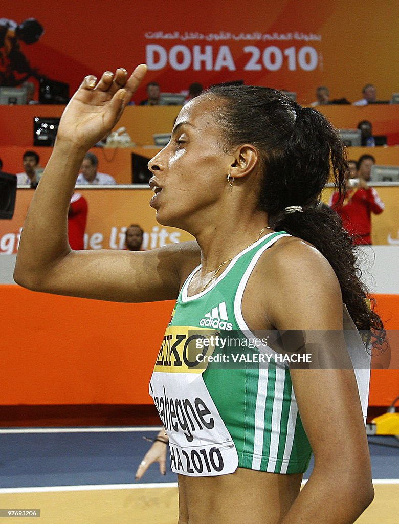 Ethiopia's Kalkidan Gezahegne celebrates after finishing first the