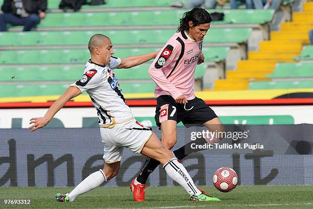 Edinson Cavani of Palermo and Gokhan Inler of Udinese during the Serie A match between Udinese Calcio and US Citta di Palermo at Stadio Friuli on...