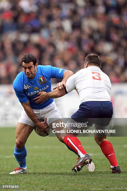 France's prop Nicolas Mas vies with Italy's winger Gonzalo Canale during the Six Nations tournament rugby union match France vs. Italy on March 14,...