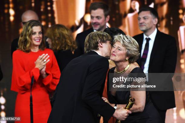 April 2018, Germany, Berlin, Palais am Funkturm venue: 68th German Film Prize, Lola, award, ceremony, award show: Film producer Karsten Stoeter and...