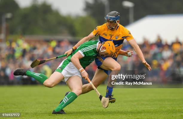 Ennis , Ireland - 17 June 2018; Seamus Flanagan of Limerick in action against David McInerney of Clare during the Munster GAA Hurling Senior...