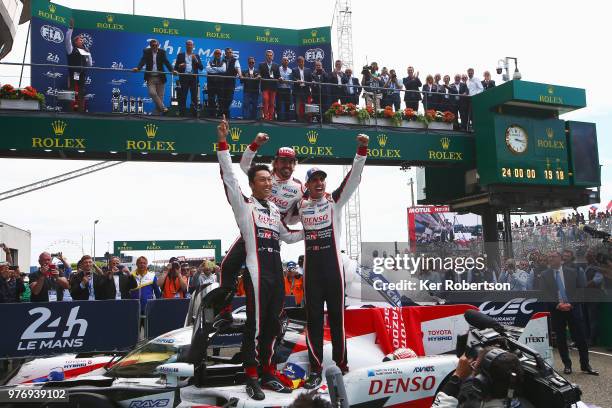 The Toyota Gazoo Racing TS050 Hybrid team of Kazuki Nakajima, Fernando Alonso and Sebastien Buemi celebrate after Toyota win for the first time at...