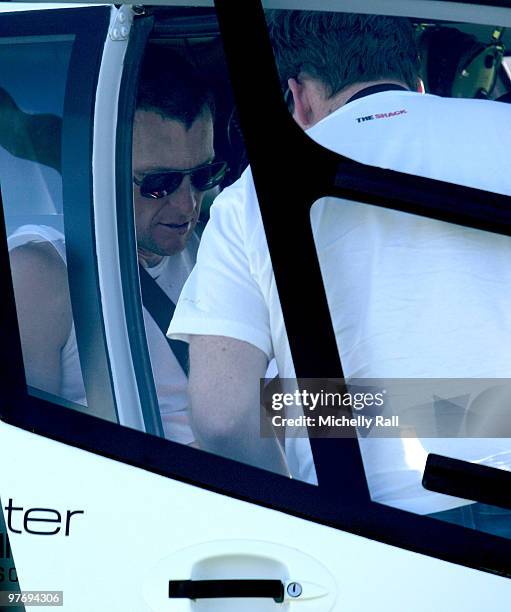 Lance Armstrong leaving in a private helicopter after finishing at the 33rd Argus Pick and Pay Cycle Tour on March 14, 2010 in Cape Town, South...