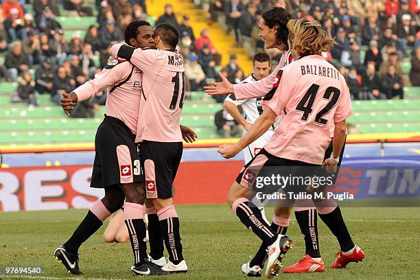 Fabio Simplicio of Palermo celebrates the equalizing goal with team-mates during the Serie A match between Udinese Calcio and US Citta di Palermo at...