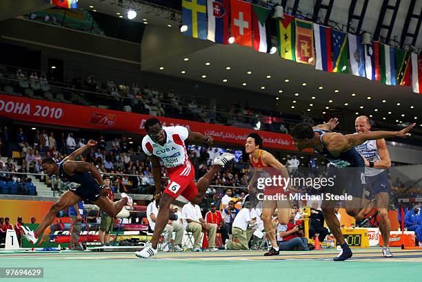 Dayron Robles of Cuba crosses the line to win the gold medal in the Mens 60m Hurdles Final during Day 3 of the IAAF World Indoor Championships at the...