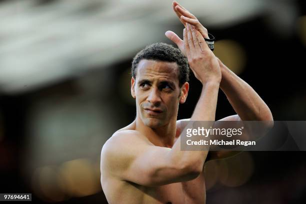 Rio Ferdinand of Manchester United applauds the fans after the Barclays Premier League match between Manchester United and Fulham at Old Trafford on...
