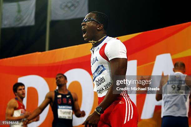 Dayron Robles of Cuba celebrates winning the gold medal in the Mens 60m Hurdles Final during Day 3 of the IAAF World Indoor Championships at the...