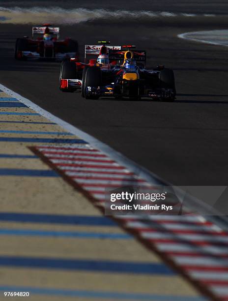 Sebastian Vettel of Germany and Red Bull Racing drives during the Bahrain Formula One Grand Prix at the Bahrain International Circuit on March 14,...