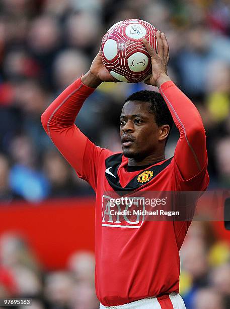 Patrice Evra of Manchester United takes a throw in during the Barclays Premier League match between Manchester United and Fulham at Old Trafford on...