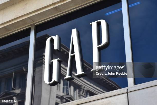 Fashion retail shop sign above the entrance on Oxford Street on June 11, 2018 in London, England.