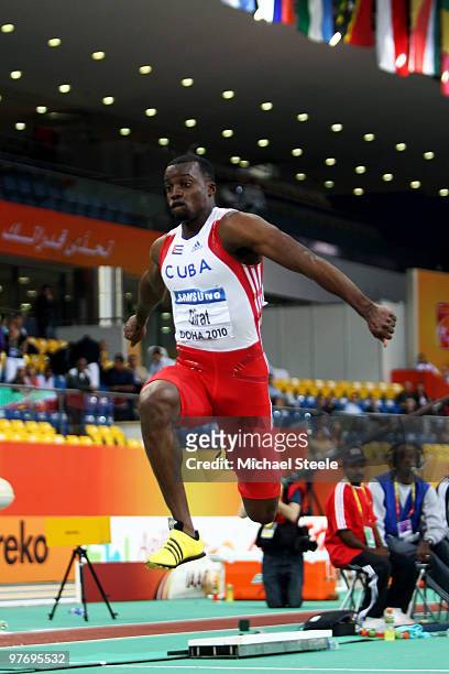Arnie David Girat of Cuba competes in the Mens Triple Jump Final during Day 3 of the IAAF World Indoor Championships at the Aspire Dome on March 14,...