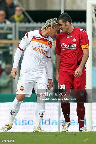 Cristiano Lucarelli of AS Livorno Calcio and Philippe Mexes of AS Roma during the Serie A match between AS Livorno Calcio and AS Roma at Stadio...