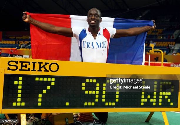 Teddy Tamgho of France celebrates victory and the new world record of 17.90m in the Mens Triple Jump Final during Day 3 of the IAAF World Indoor...