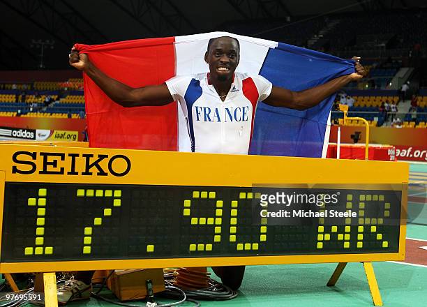 Teddy Tamgho of France celebrates victory and the new world record of 17.90m in the Mens Triple Jump Final during Day 3 of the IAAF World Indoor...