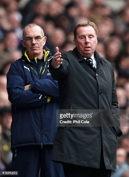 Harry Redknapp , Manager of Tottenham Hotspur and his first team coach Joe Jordan look on during the Barclays Premier League match between Tottenham...