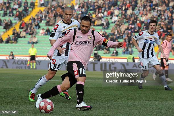 Fabrizio Miccoli of Palermo and Gokhan Inler of Udinese compete for the ball during the Serie A match between Udinese Calcio and US Citta di Palermo...