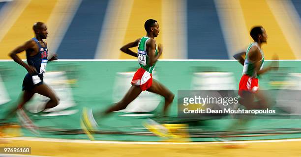 Dejen Gebremeskel of Ethiopia competes in the Mens 3000m Final during Day 3 of the IAAF World Indoor Championships at the Aspire Dome on March 14,...