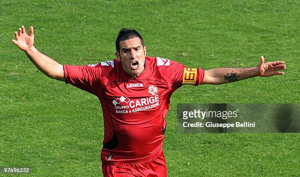 Cristiano Lucarelli of Livorno celebrates the opening goal during the Serie A match between AS Livorno Calcio and AS Roma at Stadio Armando Picchi on...