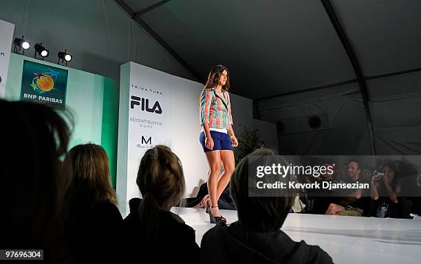 Player Sorana Cirstea of Romania participates in a fashion show during the BNP Paribas Open on March 13, 2010 in Indian Wells, California.