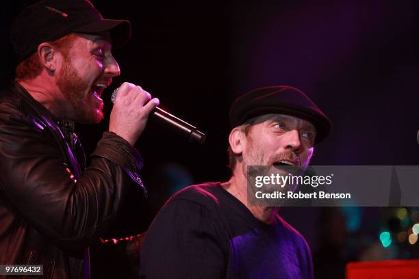 Hugh Laurie and Scott Grimes from Band with TV performs at the grand opening of Loehmann's in Costa Mesa on March 13, 2010 in Costa Mesa, California.