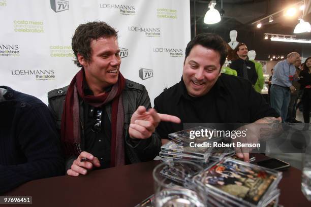 Bob Guiney and Greg Grunberg from Band with TV sign autographs at the grand opening of Loehmann's in Costa Mesa on March 13, 2010 in Costa Mesa,...