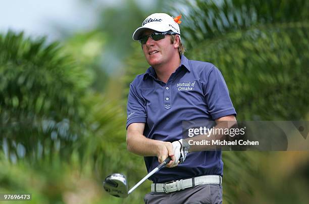 Aron Price of Australia wears an orange ribbon in memory of two teenagers who were recently murdered in California, during the continuation of the...