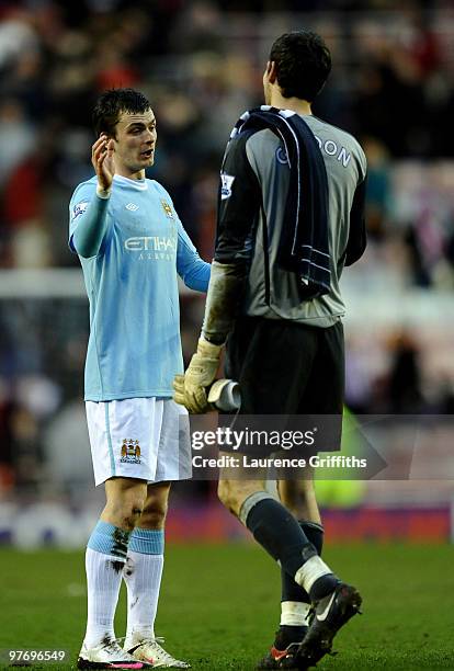 Adam Johnson of Manchester City shakes hands with Craig Gordon of Sunderland at the end of the Barclays Premier League match between Sunderland and...