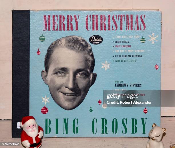 Copy of singer Bing Crosby's 1945 Decca label album 'Merry Christmas' for sale in an antique shop in Santa Fe, New Mexico. The album includes...