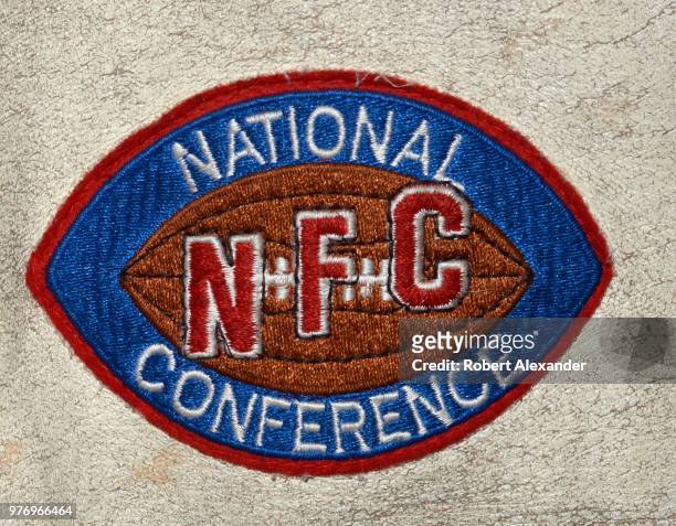 National Football Conference logo on a vintage 1980s San Francisco 49ers jacket for sale in an antique shop.