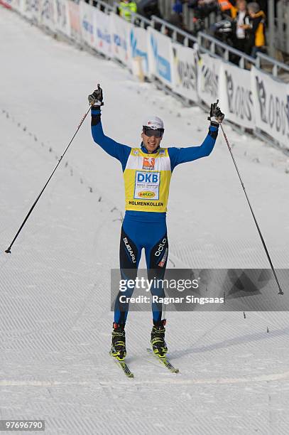 Jason Lamy-Chappuis of France celebrates his overall world cup victory after the last race of the season in the Gundersen Ski Jumping HS 134/10km...