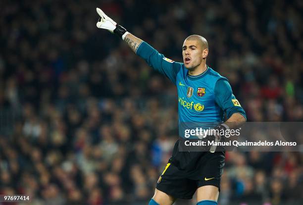 Victor Valdes of FC Barcelona gives instructions during the La Liga match between Barcelona and Valencia at the Camp Nou Stadium on March 14, 2010 in...